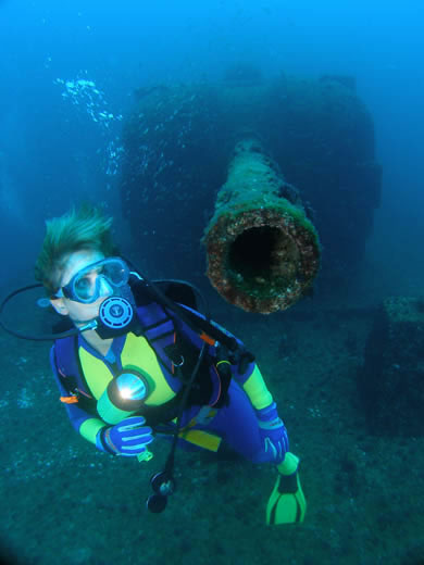 Dive HMAS Brisbane - Her Story Image Gallery  Helen at forward gun Nigel marsh Photohgraphy
